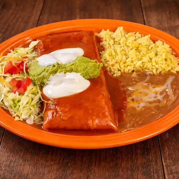 Mexican plate with enchilada, rice and beans served hot at Javier's Authentic Mexican Food Los Angeles CA